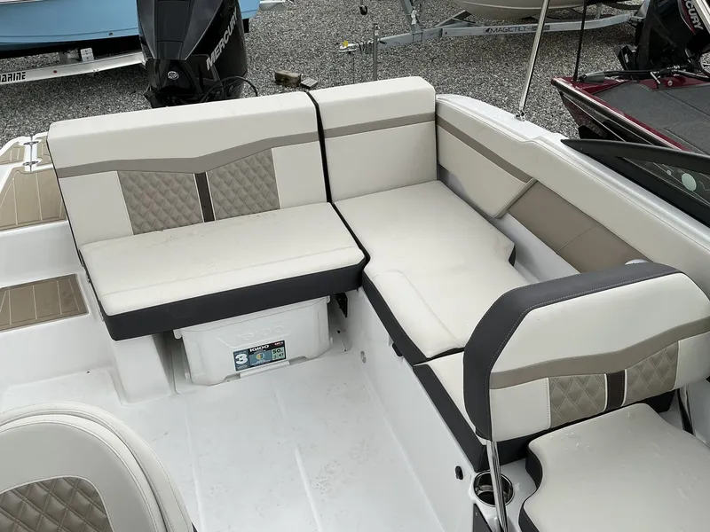 Slide: The Image of The 2025 Monterey M-205 features sleek, cushioned seating with modern accents. - 11