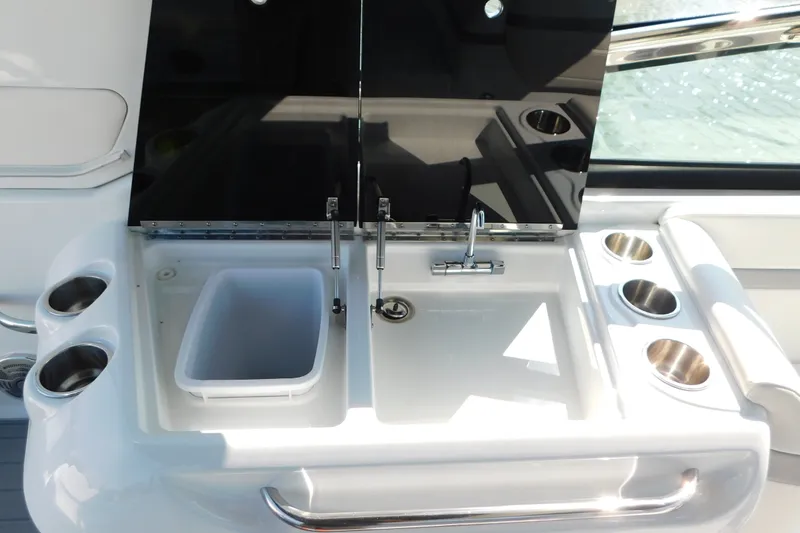 Slide: The Image of 2012 Formula 350 Sun Sport boat sink with cup holders and faucet. - 28