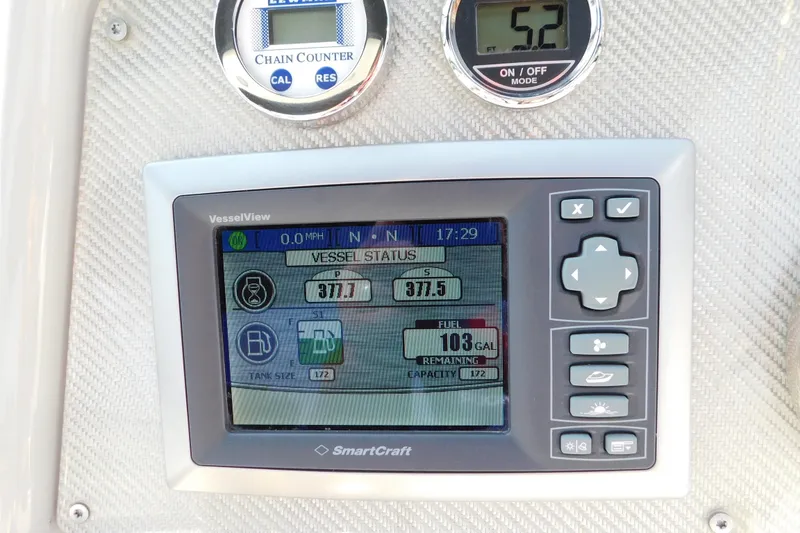 Slide: The Image of Control panel of a 2012 Formula 350 Sun Sport boat displaying vessel status and fuel information. - 38