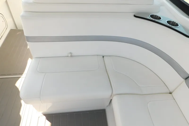 Slide: The Image of Interior seating of a 2012 Formula 350 Sun Sport boat with white upholstery. - 20