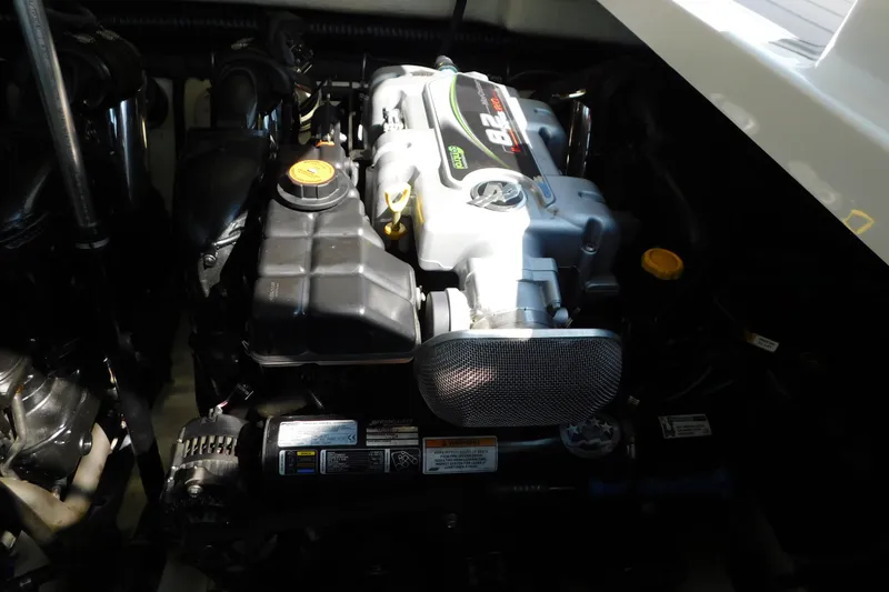 Slide: The Image of Engine compartment of a 2012 Formula 350 Sun Sport boat, showcasing detailed components. - 80