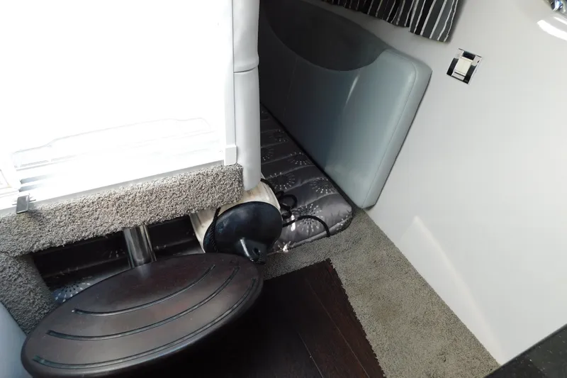 Slide: The Image of Interior of 2012 Formula 350 Sun Sport boat with seating and carpeted flooring. - 62