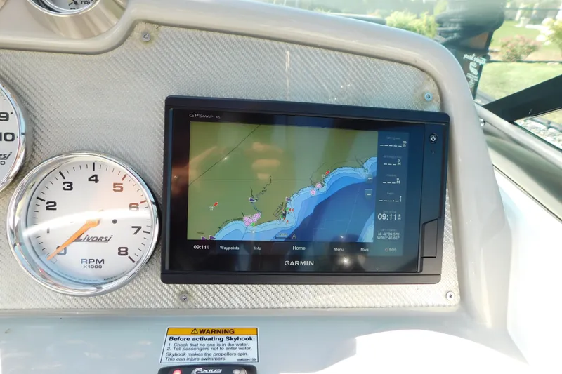 Slide: The Image of Dashboard of a 2012 Formula 350 Sun Sport with Garmin GPS and Livorsi RPM gauge. - 36