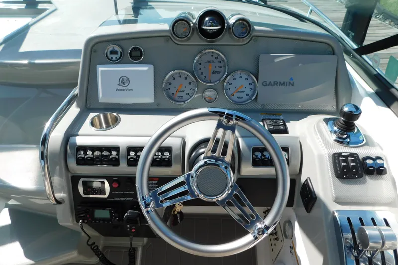 Slide: The Image of Control panel of a 2012 Formula 350 Sun Sport boat with Garmin navigation system. - 35