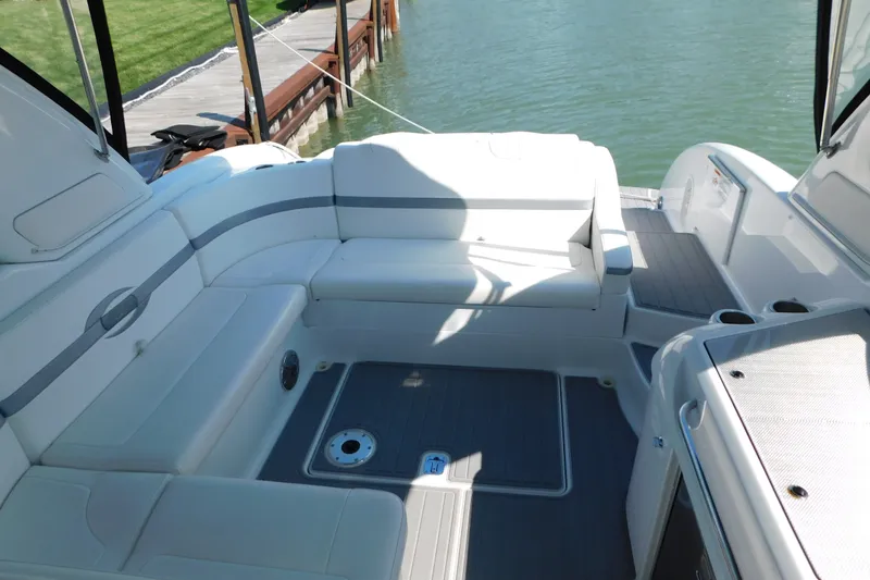Slide: The Image of 2012 Formula 350 Sun Sport boat interior with white seating and sleek design. - 29