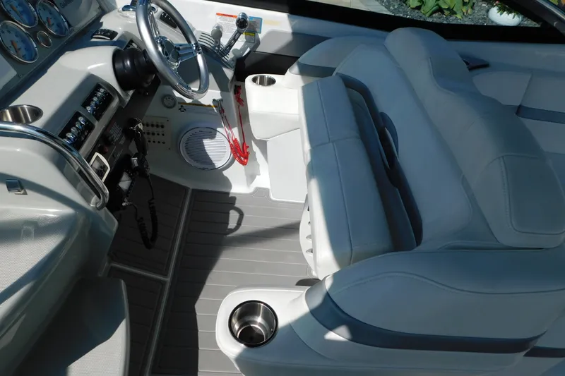 Slide: The Image of 2012 Formula 350 Sun Sport cockpit with steering wheel, gauges, and seating. - 30