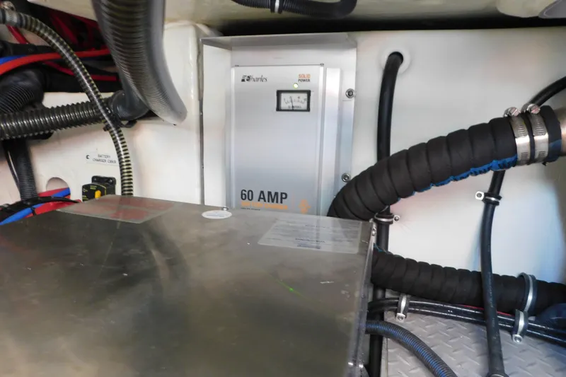 Slide: The Image of Engine compartment of 2012 Formula 350 Sun Sport with 60 AMP battery charger. - 91