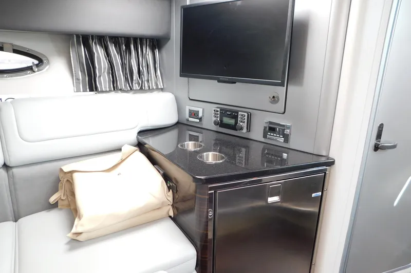 Slide: The Image of Interior of 2012 Formula 350 Sun Sport with TV, seating, and kitchenette. - 48