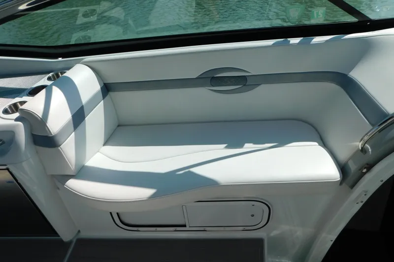 Slide: The Image of 2012 Formula 350 Sun Sport boat interior with white seating and cup holders. - 42