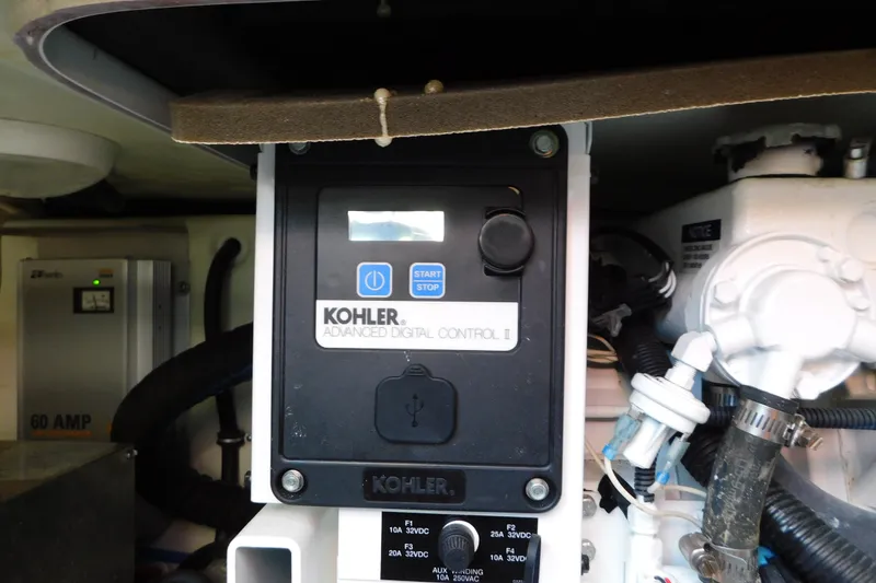 Slide: The Image of Kohler Advanced Digital Control panel in 2012 Formula 350 Sun Sport boat engine room. - 86
