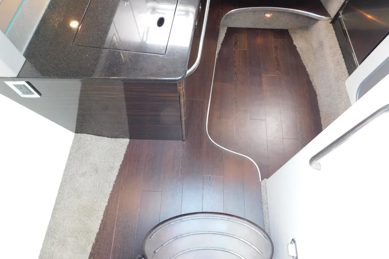 Slide: The Image of Interior view of 2012 Formula 350 Sun Sport with sleek wood flooring and modern design. - 44