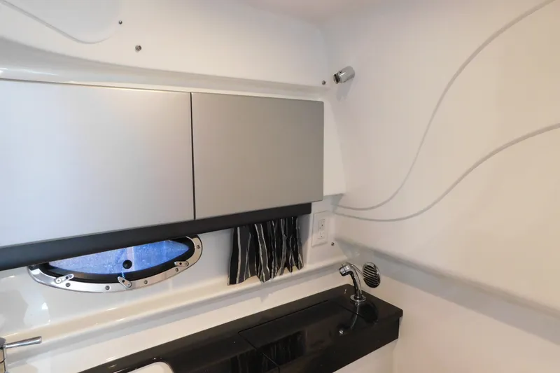 Slide: The Image of Interior of 2012 Formula 350 Sun Sport boat with sleek cabinetry and modern sink. - 71