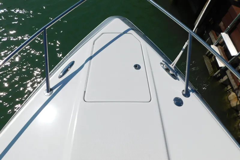 Slide: The Image of Bow of a 2012 Formula 350 Sun Sport boat with stainless steel railings. - 96