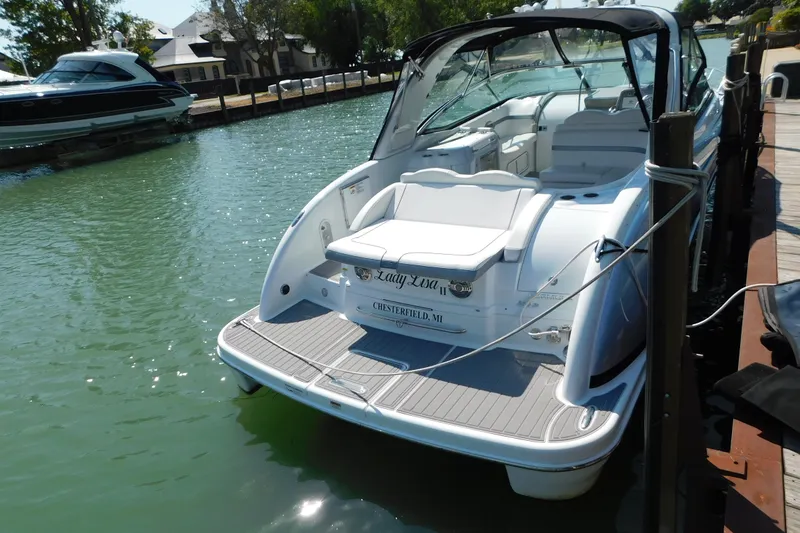 Slide: The Image of 2012 Formula 350 Sun Sport docked in a serene marina setting. - 93