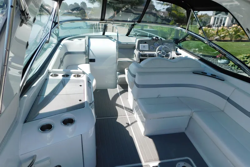 Slide: The Image of 2012 Formula 350 Sun Sport boat interior with sleek seating and modern dashboard. - 15