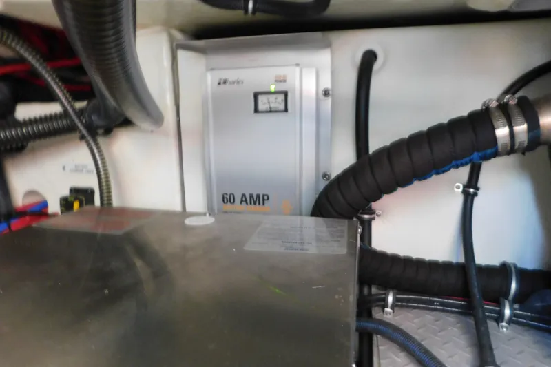 Slide: The Image of Engine compartment of 2012 Formula 350 Sun Sport with 60 AMP charger and wiring. - 90