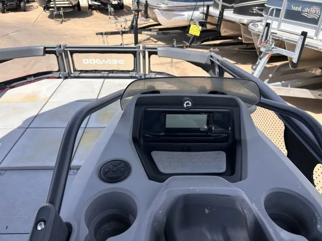 Slide: The Image of The image shows the cockpit of a 2022 Sea-Doo Switch Sport 18 with a steering console. - 17