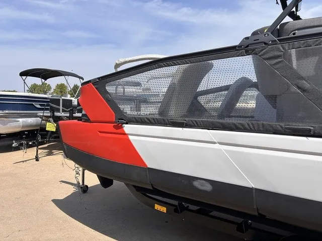 Slide: The Image of A 2022 Sea-Doo Switch Sport 18 with a sleek design and red accents, on a trailer. - 3