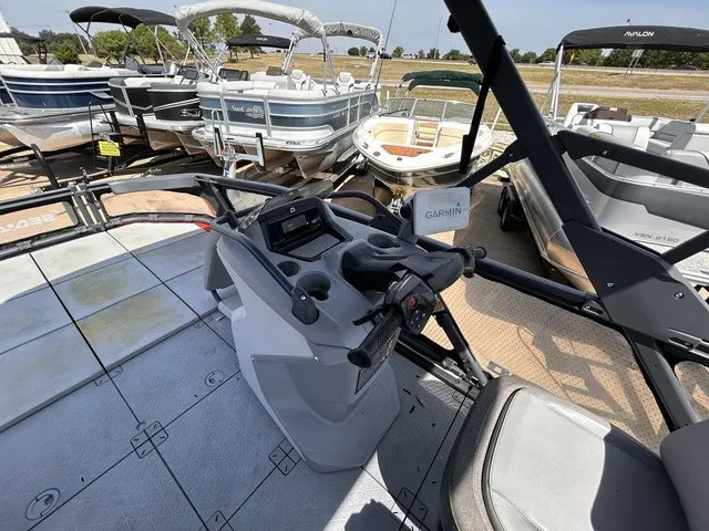Slide: The Image of The image shows the cockpit of a 2022 Sea-Doo Switch Sport 18 with steering and instruments. - 15