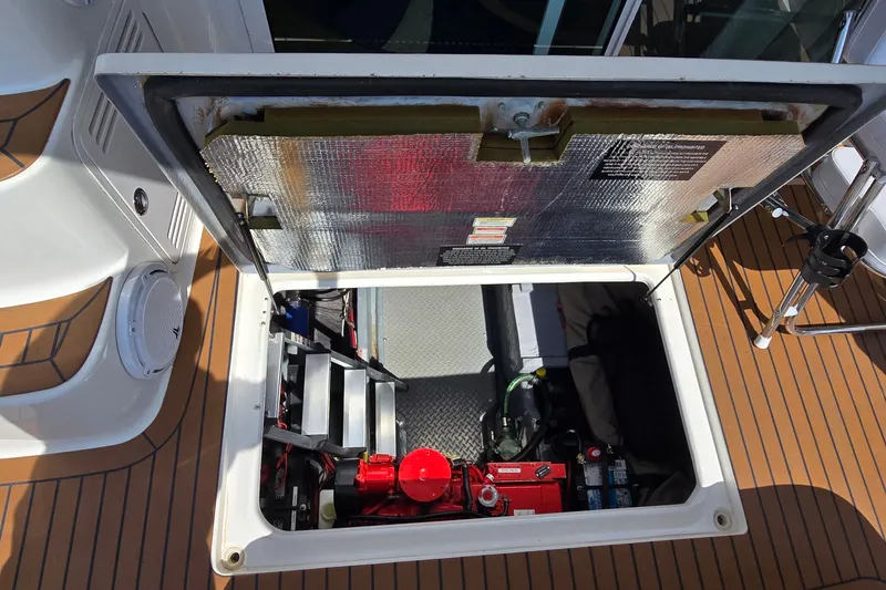 Slide: The Image of Open engine compartment of a 2000 Sea Ray 400 Sedan Bridge yacht. - 51