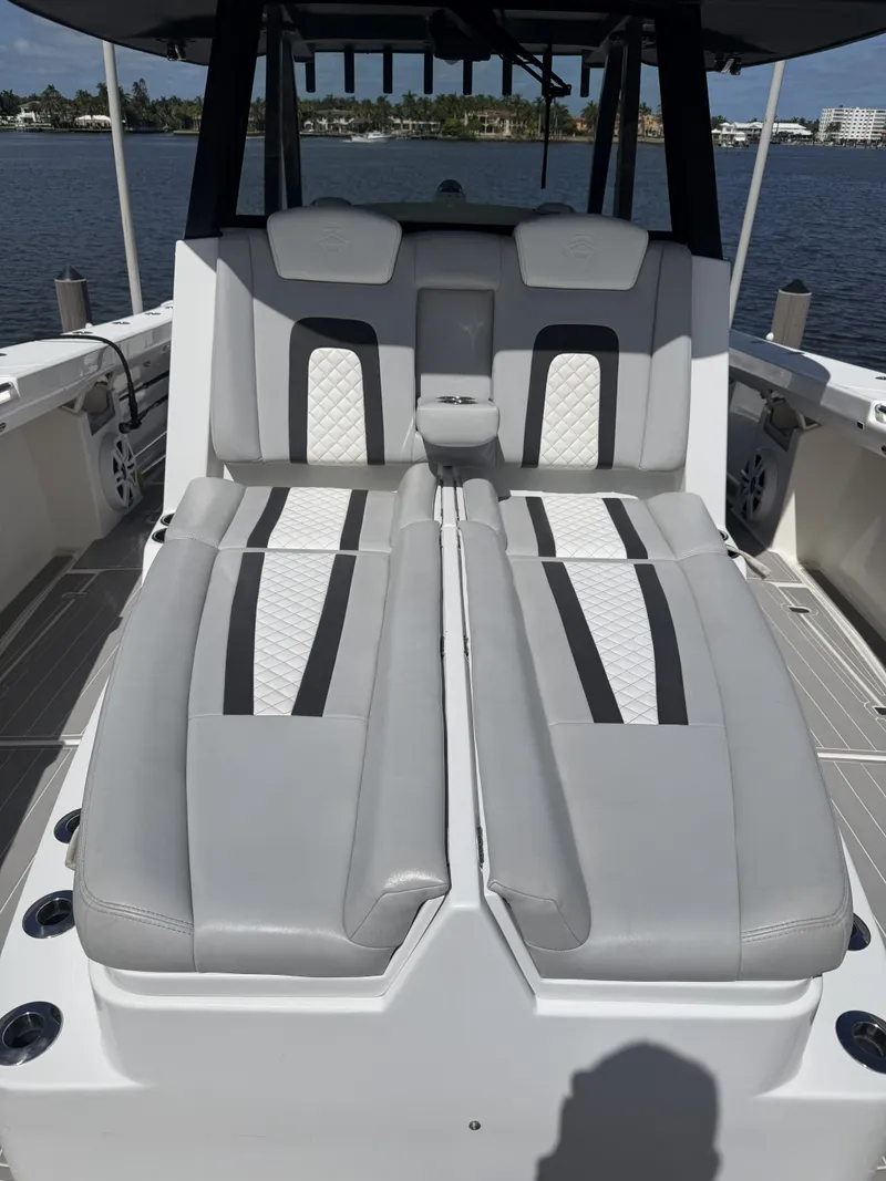 Slide: The Image of The image shows the cockpit of a 2023 Hammer Yachts 35 Cat with luxurious seating. - 8