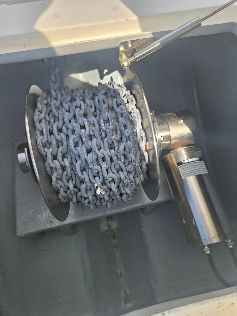 Slide: The Image of Anchor chain on a winch inside a boat. - 10
