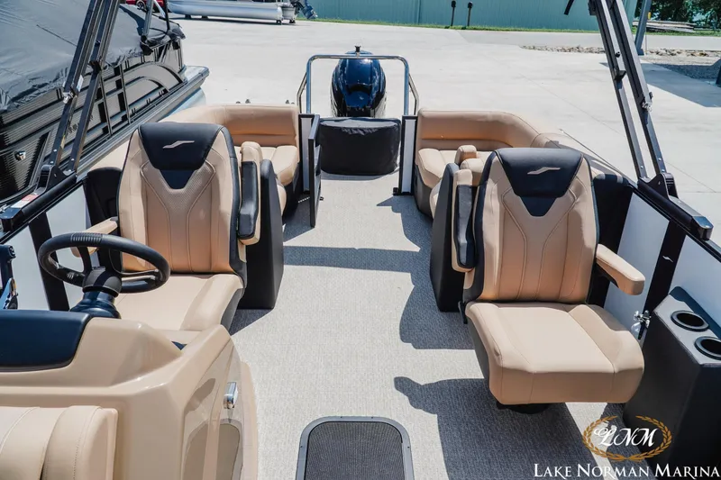 Slide: The Image of Interior of 2027 Evotti 521QL boat with luxurious seating at Lake Norman Marina. - 17