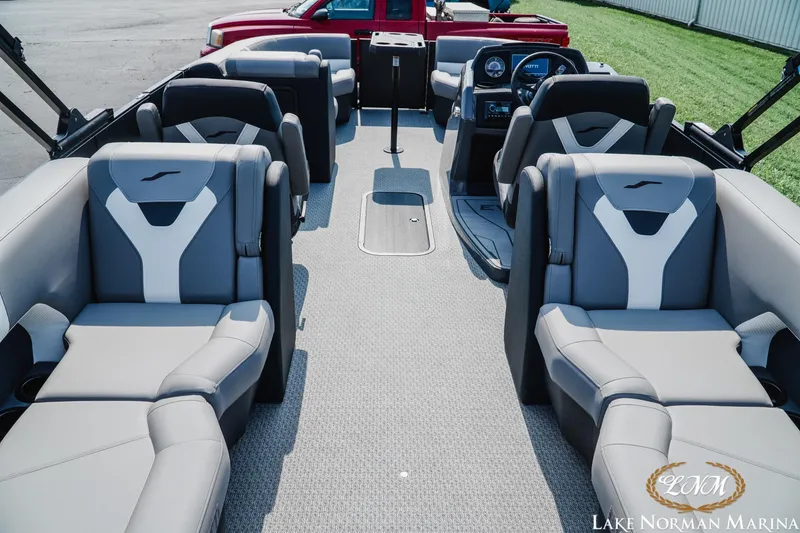 Slide: The Image of 2027 Evotti 521QL pontoon boat interior with luxurious seating and modern dashboard. - 5