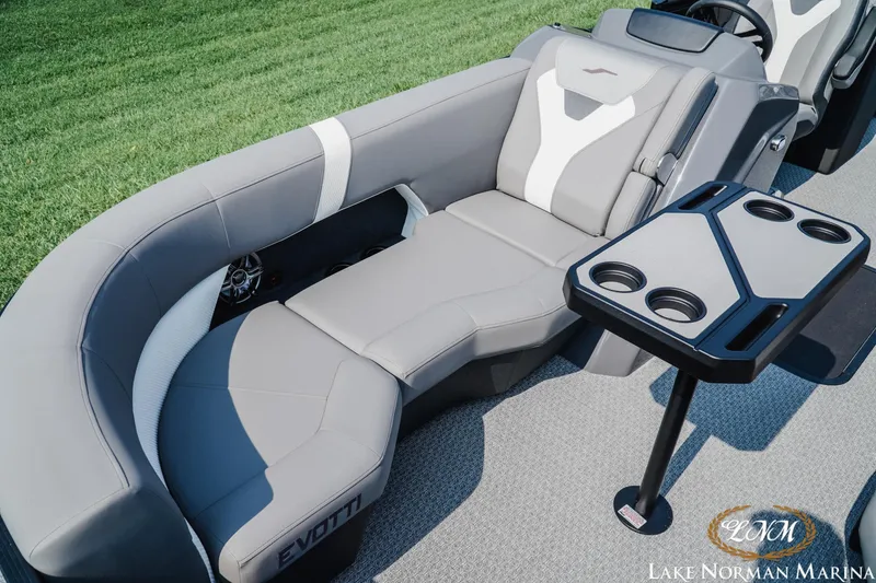 Slide: The Image of Luxurious seating on 2027 Evotti 521QL boat with cup holders, showcased at Lake Norman Marina. - 15
