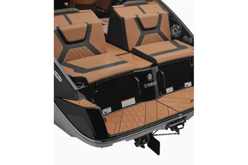 Slide: The Image of Manufacturer Provided Image: 2027 Yamaha Boats 222XD rear seating area with tan upholstery and sleek design. - 4