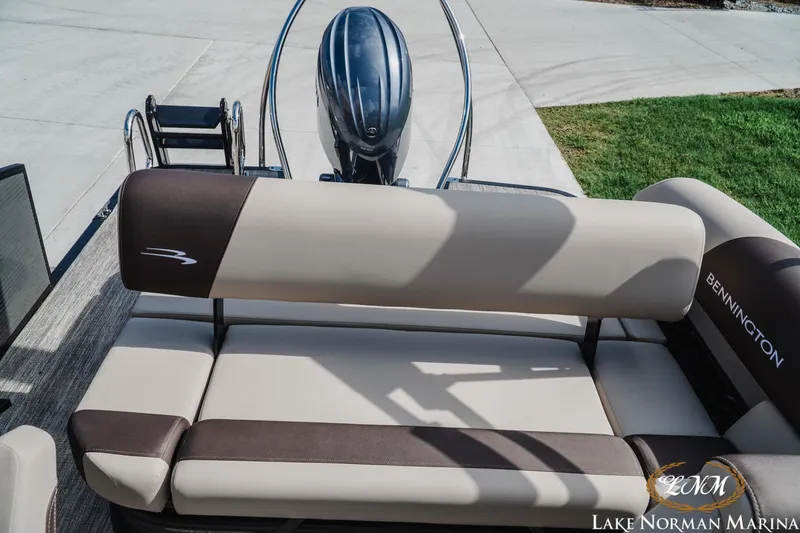 Slide: The Image of 2027 Bennington 22SSB pontoon boat with comfortable seating at Lake Norman Marina. - 16