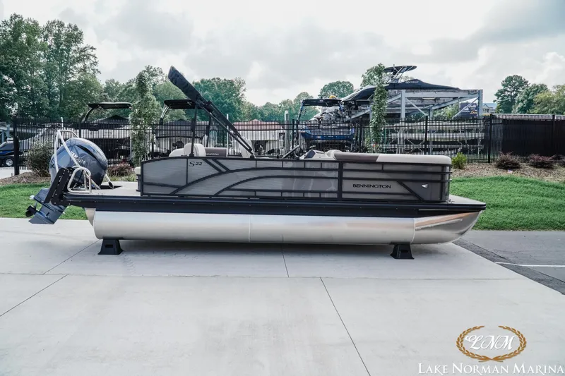 The Image of 2027 Bennington 22SSB pontoon boat at Lake Norman Marina, showcasing sleek design and modern features. - 1