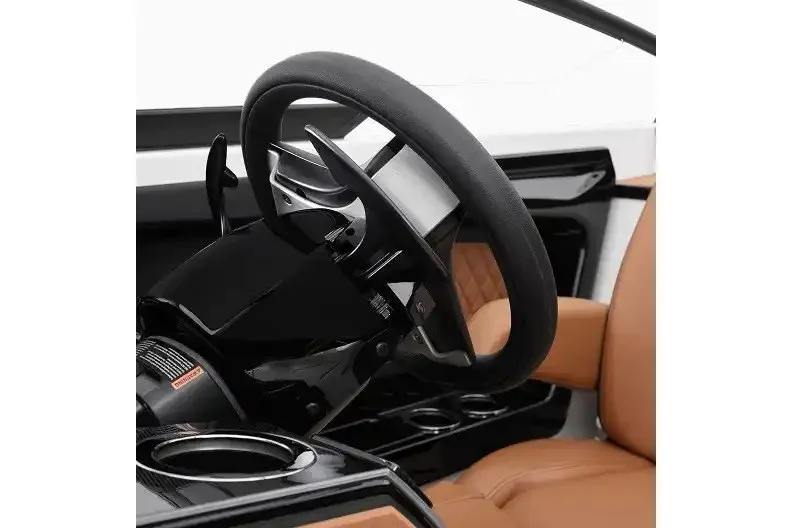 Slide: The Image of Manufacturer Provided Image: Steering wheel of 2027 Yamaha Boats 252SD, featuring sleek design and luxurious seating. - 1
