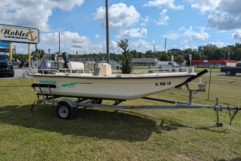 The Image of 2001 Carolina Skiff 17 boat on trailer at Nobles Marine dealership. - 1