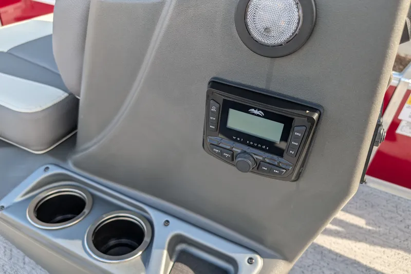 Slide: The Image of 2027 Sun Tracker Bass Buggy 16 XL Select console with stereo system and cup holders. - 13