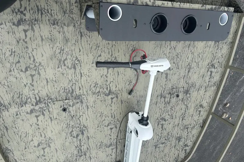 Slide: The Image of 2027 Tracker Grizzly 2072 CC Sportsman boat with Minn Kota trolling motor. - 15