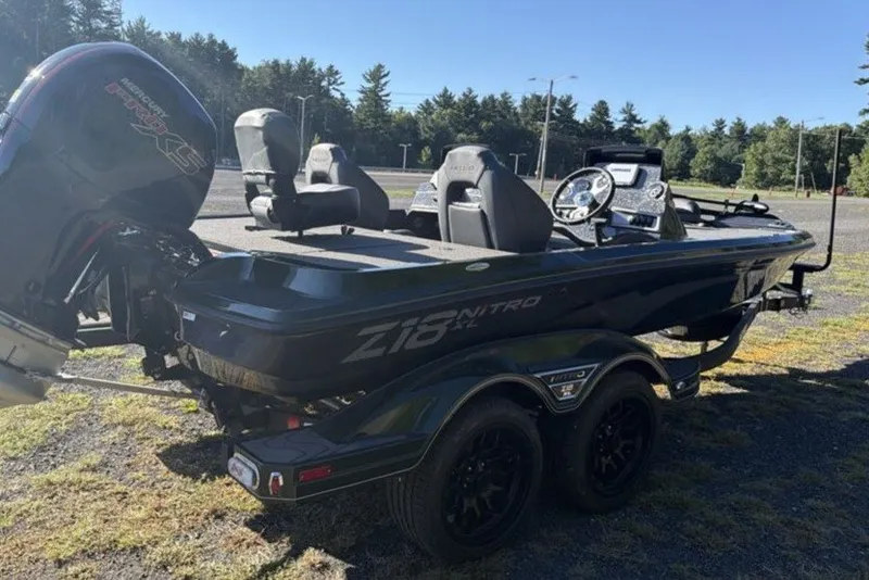 Slide: The Image of 2027 Nitro Z18 XL boat with dual seats and powerful outboard motor. - 5