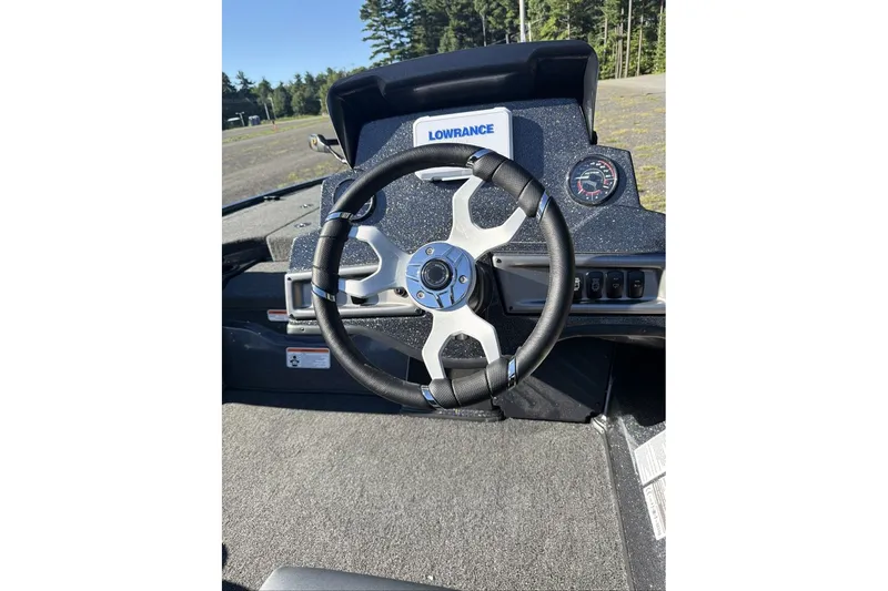 Slide: The Image of Steering wheel of 2027 Nitro Z18 XL boat with Lowrance display and gauge. - 7