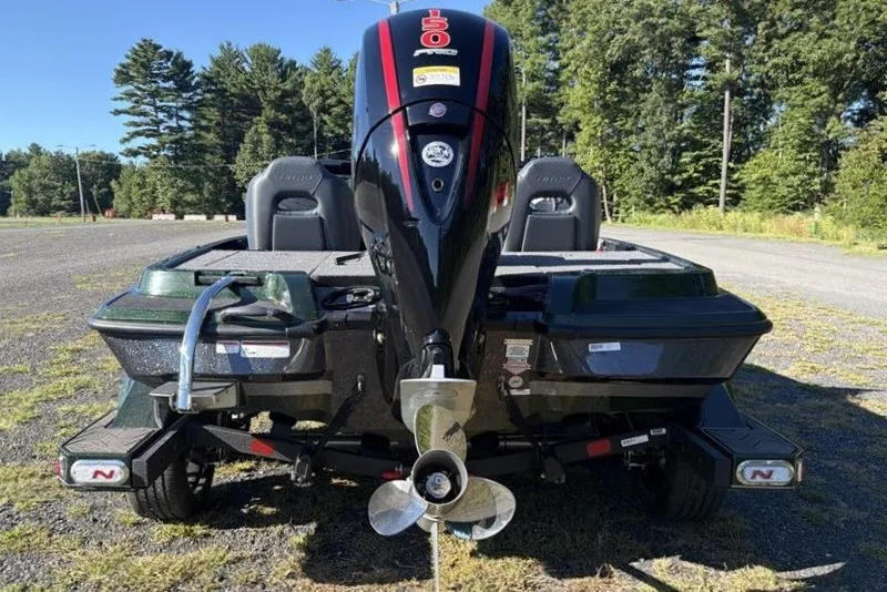 Slide: The Image of 2027 Nitro Z18 XL boat with powerful outboard motor, parked outdoors. - 3