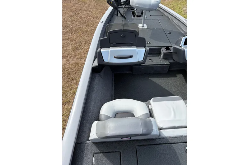 Slide: The Image of 2027 Tracker Pro Team 175 boat interior with seating and storage compartments. - 21