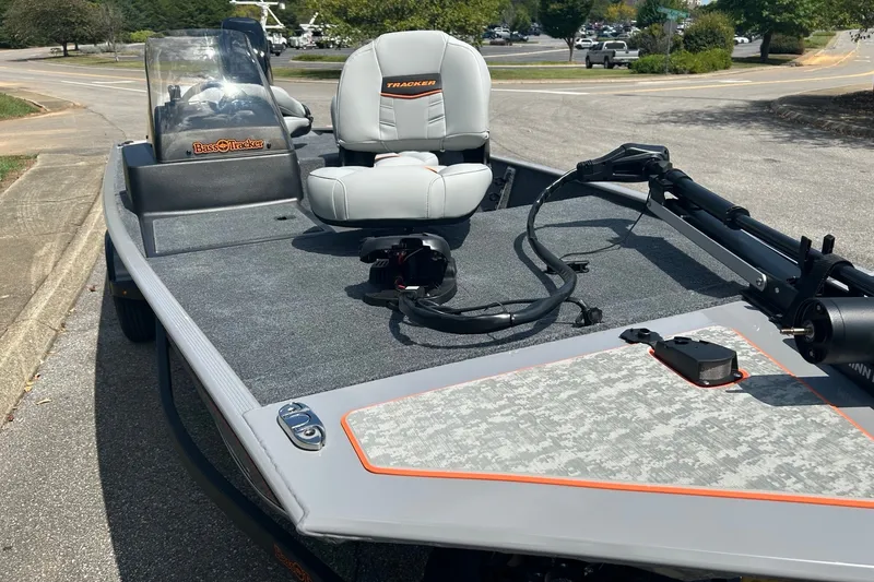 Slide: The Image of 2027 Tracker Bass Tracker Classic Limited boat with seating and fishing equipment. - 39