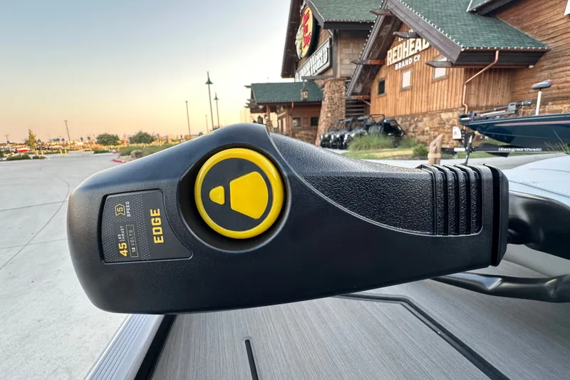 Slide: The Image of Close-up of a 2027 Tracker Pro 170 boat motor with Edge branding. - 17