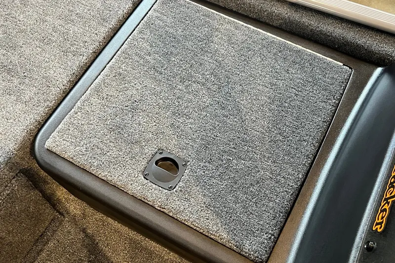 Slide: The Image of 2027 Tracker Bass Tracker Classic Limited boat deck with carpeted storage compartment. - 21