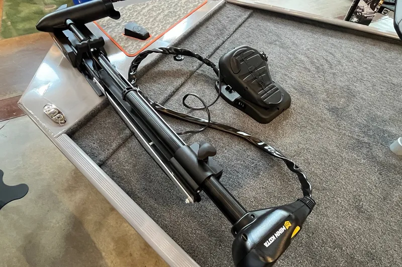 Slide: The Image of 2027 Tracker Bass Tracker Classic Limited boat with Minn Kota trolling motor. - 15