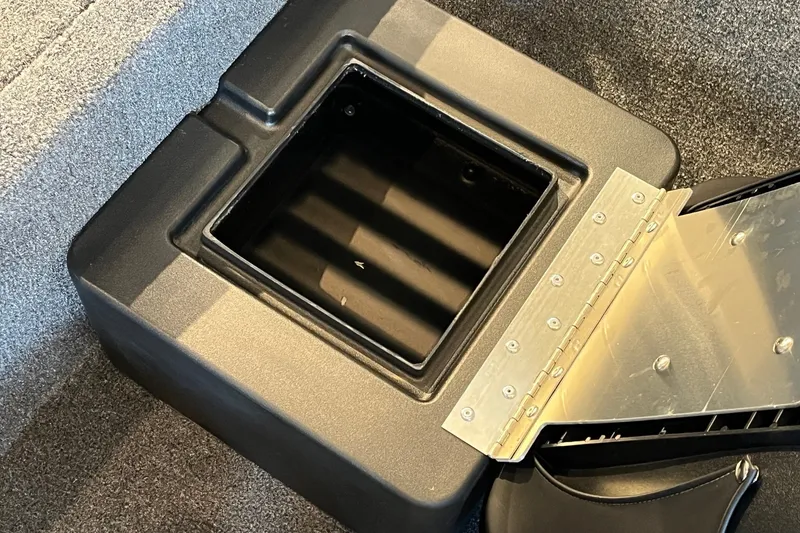 Slide: The Image of Open storage compartment in 2027 Tracker Bass Tracker Classic Limited boat. - 13