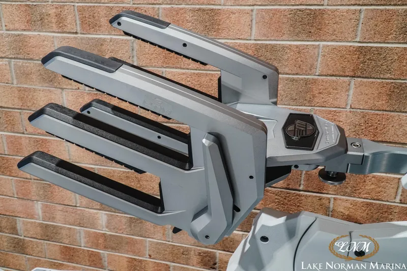 Slide: The Image of 2027 Malibu M230 boat accessory against brick wall at Lake Norman Marina. - 36