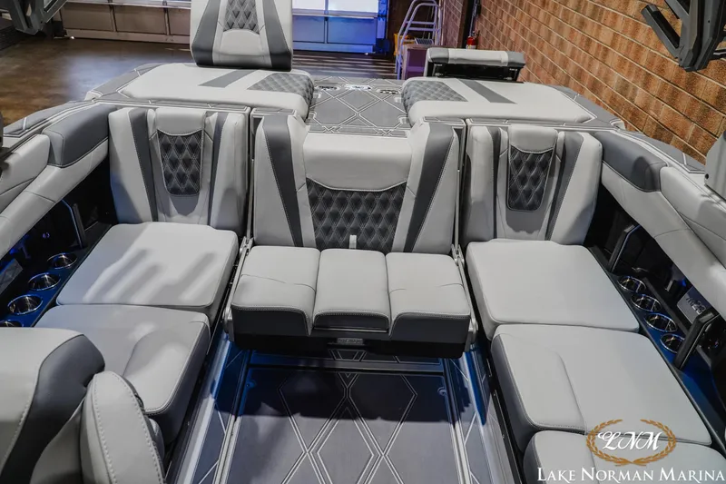 Slide: The Image of Luxurious interior seating of 2027 Malibu M230 boat at Lake Norman Marina. - 31