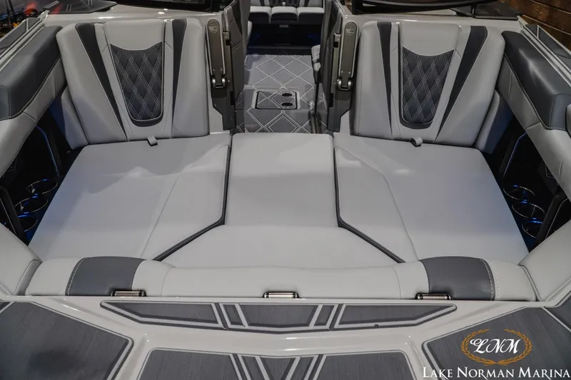 Slide: The Image of Luxurious interior of 2027 Malibu M230 boat with sleek seating and modern design. - 5