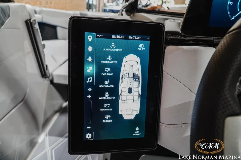 Slide: The Image of Touchscreen control panel in 2027 Malibu M230 boat, displaying various onboard system settings. - 25