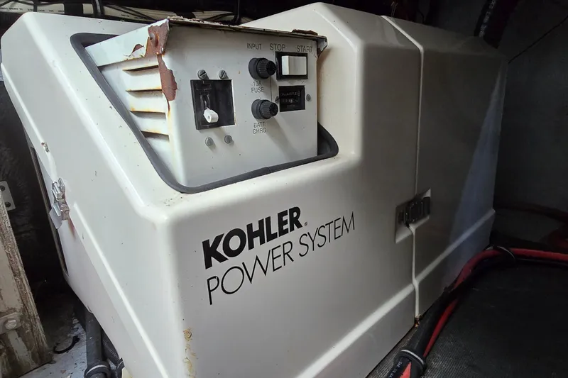 Slide: The Image of Kohler power system in 1998 Chaparral Signature 300 boat engine room. - 32